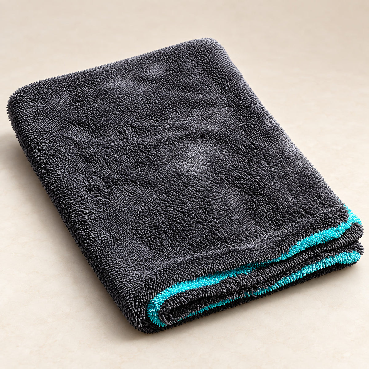 Grey Hydrolock drying towel with turquoise detailing