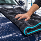 AI-assisted illustrative view of the grey and turquoise Hydrolock towel drying a rinsed car hood